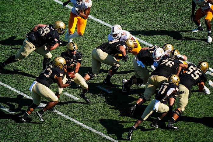 College football returned this fall—including this game between Army and Louisiana Monroe—amid a pandemic; experts predict that schools and the NCAA will face future litigation over not just head injuries, but also the coronavirus.